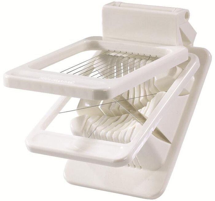 Eggjaskeri tvöfaldur sker í sneiðar og báta